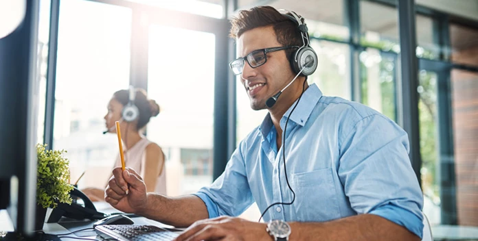 man with headset showing kindness